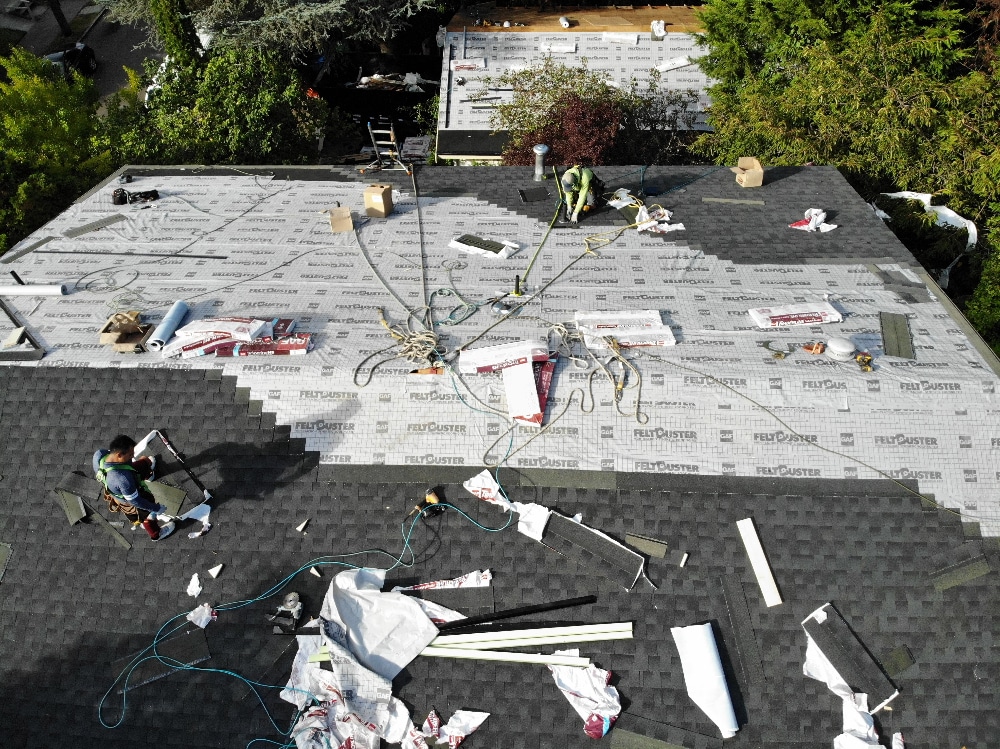 Read more about the article Reroofing vs Roof Replacement: Which One Should You Go For?
