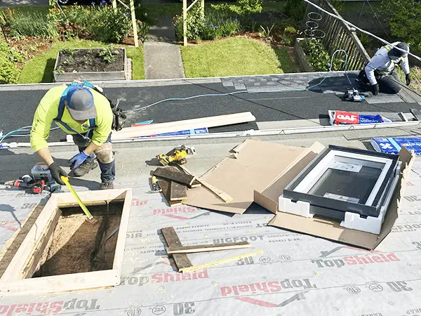 residential roof being repaired