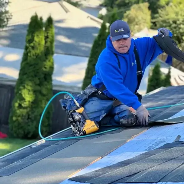 man working on a roof