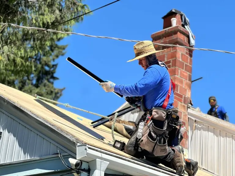 professional roof installer working fixing a roof