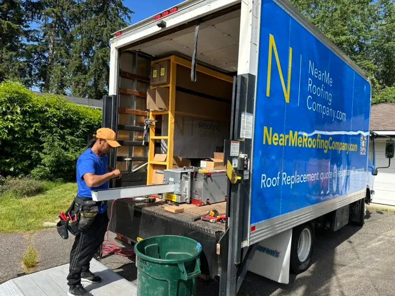 man unloading roofing work tools from a truck