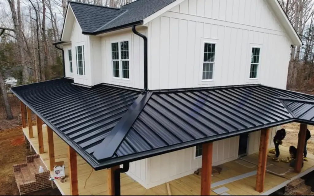 building with a shiny black metal roof